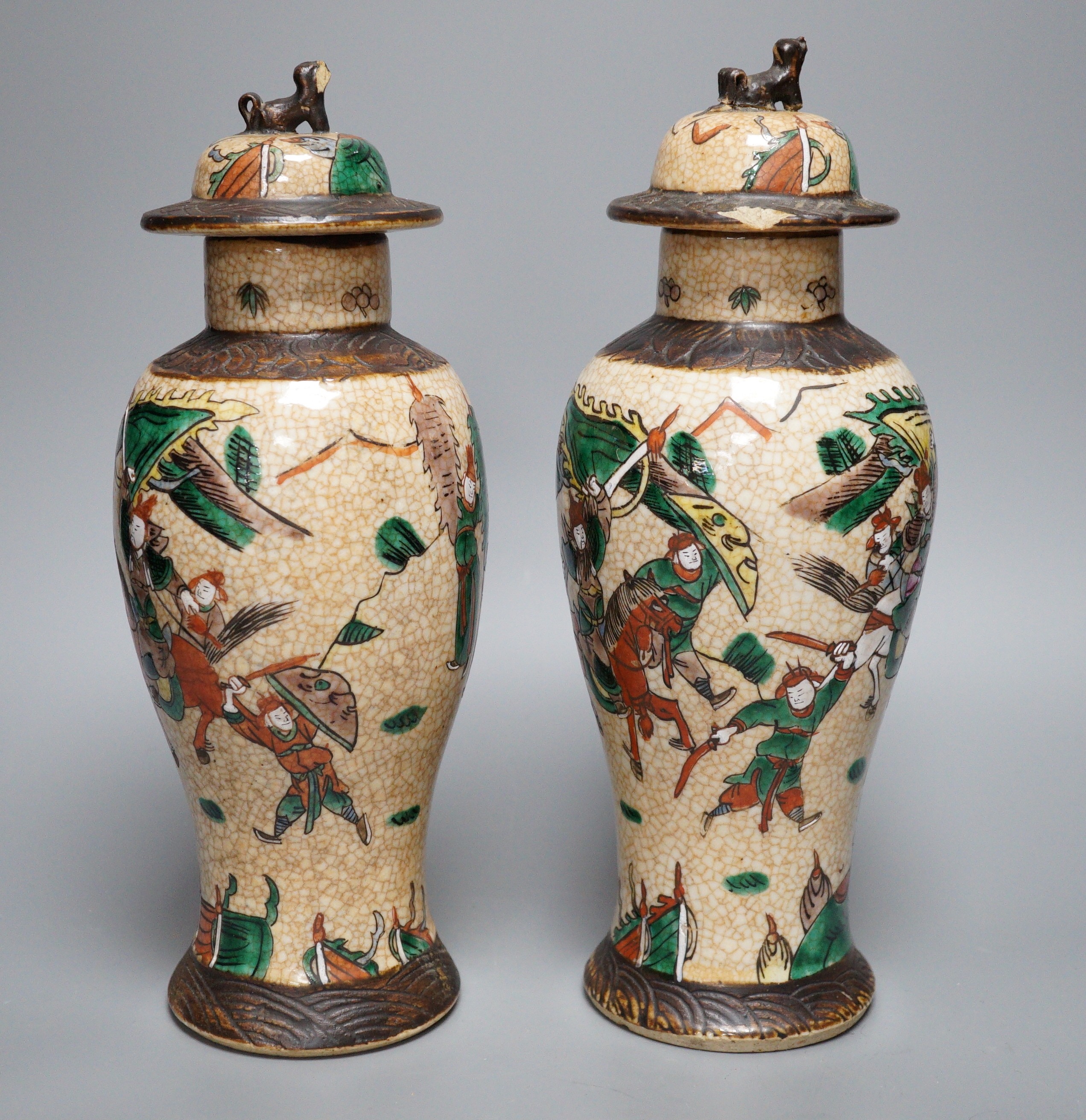 A pair of Chinese crackleware lidded vases, 30cm